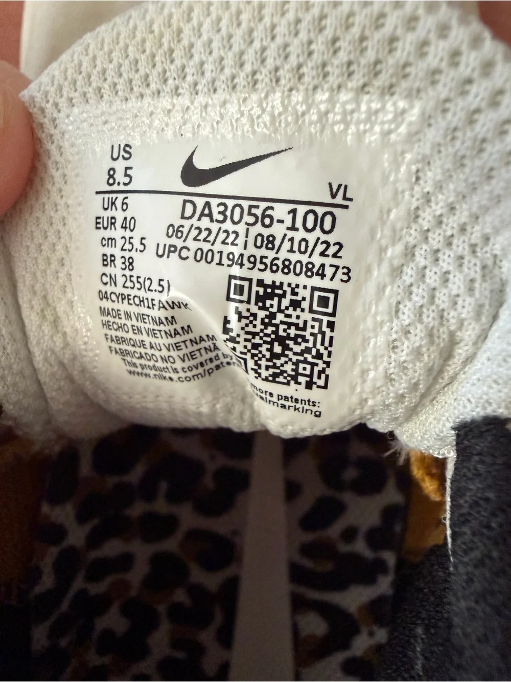 Nike Women’s White Athletic Sneakers with Leopard-Print Swoosh